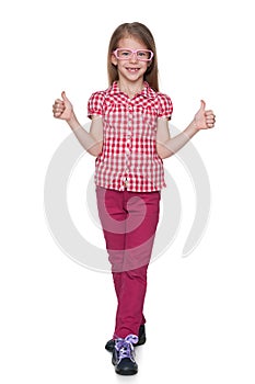 Cute little girl holds his thumbs up