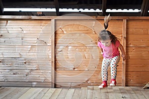 Cute little girl jumping