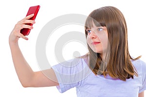 Cute little girl making selfie