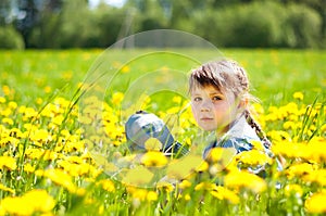 Cute little girl in the meadow