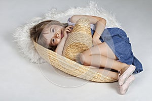 Cute little girl in a mexican big hat, sumbrero