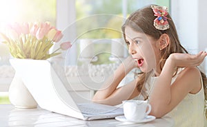 Little girl with laptop