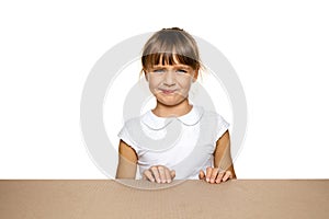 Cute little girl opening the biggest postal package