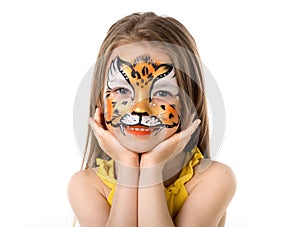 Cute little girl with painted face