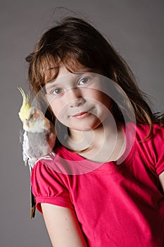 Girl with a cockatiel