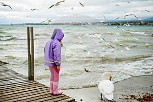 Cute little girl playing outdoors