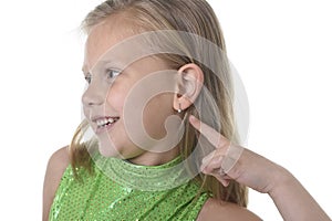 Cute little girl pointing her ear in body parts learning school chart serie photo