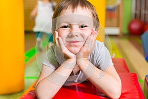 Cute little girl portrait in daycare