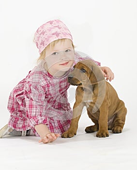 Cute little girl with puppy