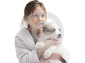 Cute little girl and puppy