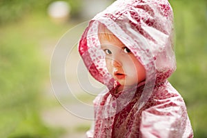 Cute little girl in the rain