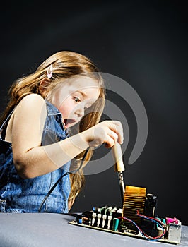 Cute little girl repair electronics by cooper-bit