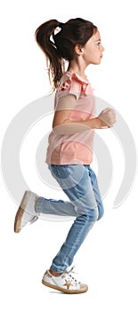 Cute little girl running on white background