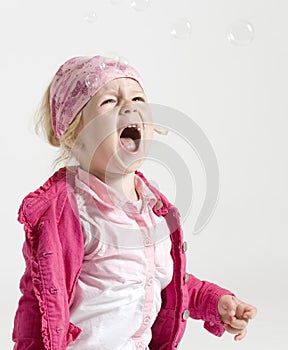 Cute little girl screeming photo