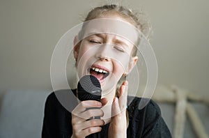 Cute little girl singing.