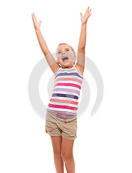 Cute little girl standing on white stretching her arms up