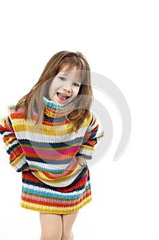 Cute little girl in a striped sweater