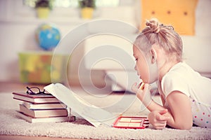 Cute little girl study mathematics