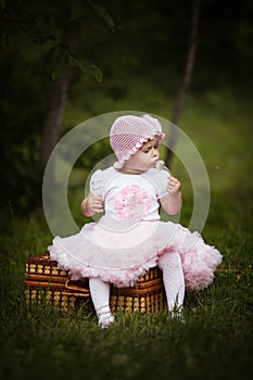 Cute little girl with suitcase