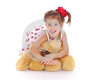 Cute little girl with a teddy bear