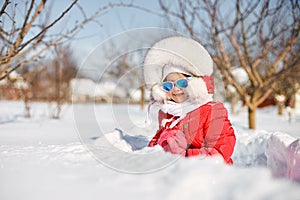 Cute little girl in winter, have fun