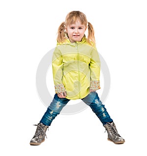 Cute little girl in yellow coat