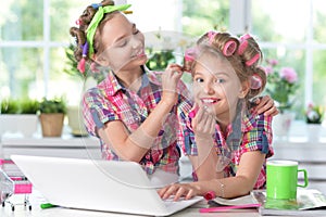 Cute little girls beautifying themselves