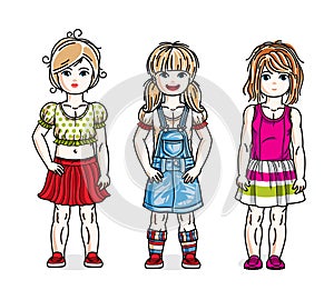 Cute little girls group standing wearing casual clothes. Vector