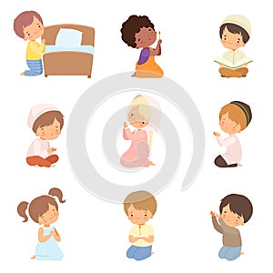 Cute Little Kids Characters Kneeling in Prayer Set Cartoon Vector Illustration photo