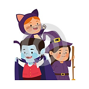 Cute little kids dressed as a dracula and witch with cat