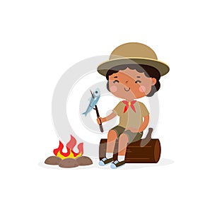 Cute little kids sitting on log and Roasting Fish and beefon campfire, boy scout or girl scout honor uniform, kids summer camp,