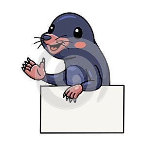 Cute little mole cartoon with blank sign