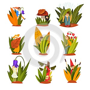 Cute little people in tall grass set, funny fairy creatures on beautiful natural landscape vector Illustration on a