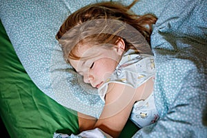 Cute Little Preschool Girl Sleeping In Bed. Adorable Preschool Child Dreaming, Healthy Sleep Of Children By Day. Deep