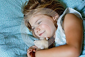 Cute Little Preschool Girl Sleeping In Bed. Adorable Preschool Child Dreaming, Healthy Sleep Of Children By Day. Deep