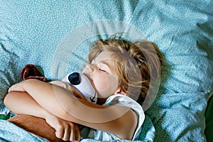 Cute Little Preschool Girl Sleeping In Bed. Adorable Preschool Child Dreaming, Healthy Sleep Of Children By Day. Deep