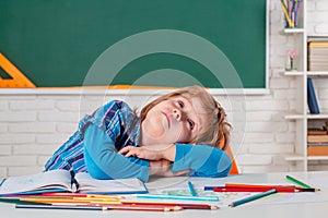 Cute little preschool kid boy with teacher study in a classroom. Learning and education concept. Home school for pupil.