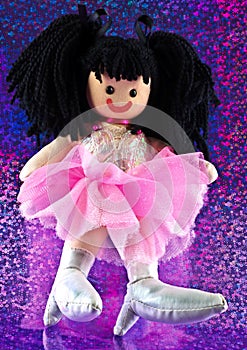 A cute little rag doll with huge feet.