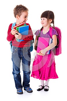 Cute little schoolgirl and schoolboy