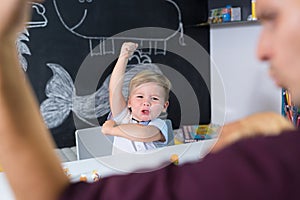 Cute little toddler boy at child therapy session.