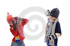 Cute little winter girl and boy snowball fight 2