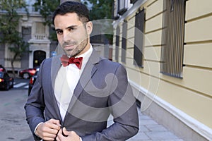 Cute man wearing red velvet bow tie