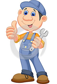 Cute mechanic cartoon holding wrench and giving thumbs up