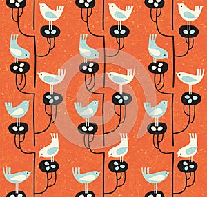 Cute mid-century style seamless pattern with birds on nests with eggs.