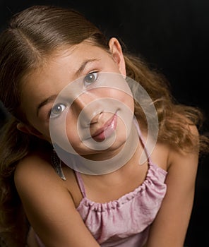 Cute mixed race girl looking up