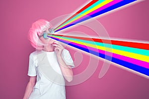 Cute Model with pink hair on unicorn color background. Neon fashion