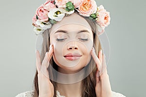 Cute Model Woman Face. Natural Makeup and Flowers, Skincare and Facial Treatment Concept