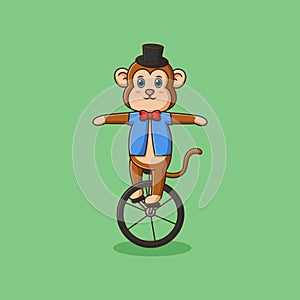Cute monkey circus riding a bicycle