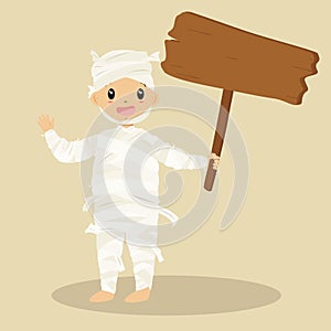 Cute Mummy Holding a Wooden Sign, Halloween Cartoon Vector