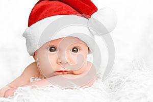 Cute newborn baby in christmas hat